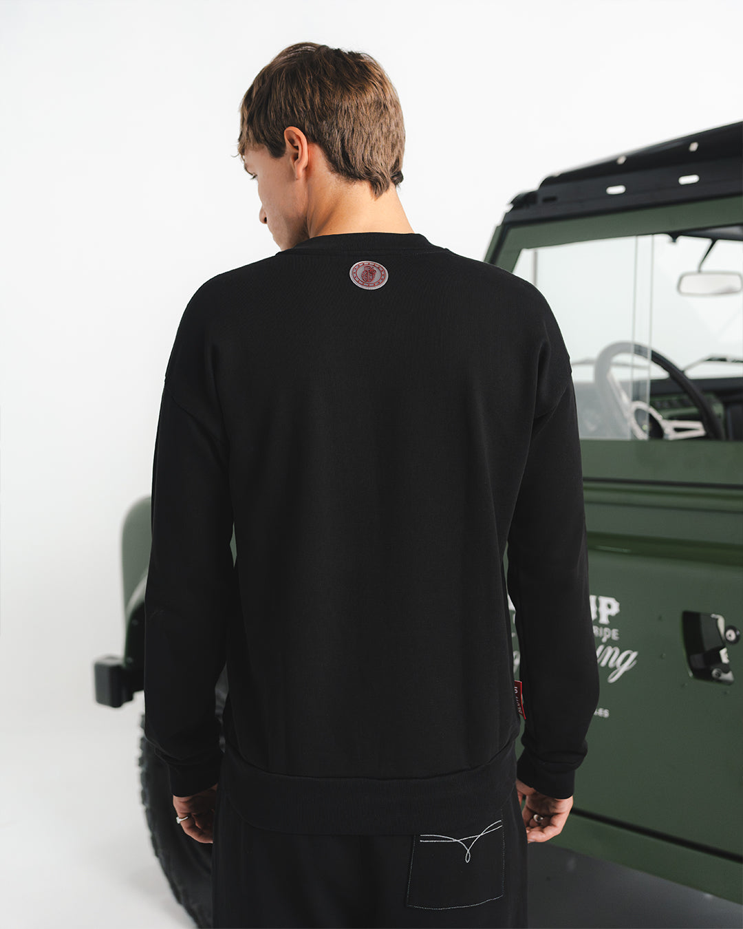 HOMECOMING BLACK CREWNECK SWEATER